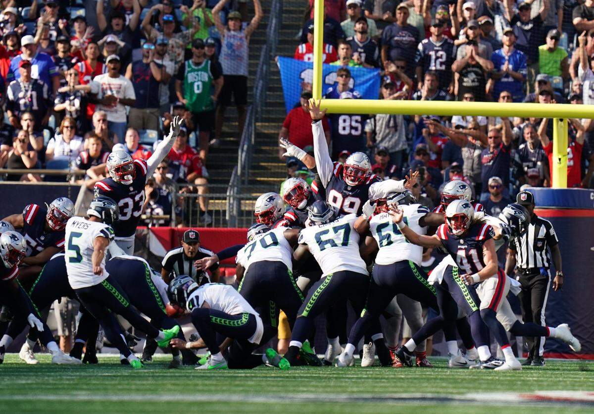 Sep 15, 2024; Foxborough, Massachusetts, USA; Seattle Seahawks place kicker Jason Myers (5) kicks a field goal to win the game against the New England Patriots in overtime at Gillette Stadium. Mandatory Credit: David Butler II-Imagn Images