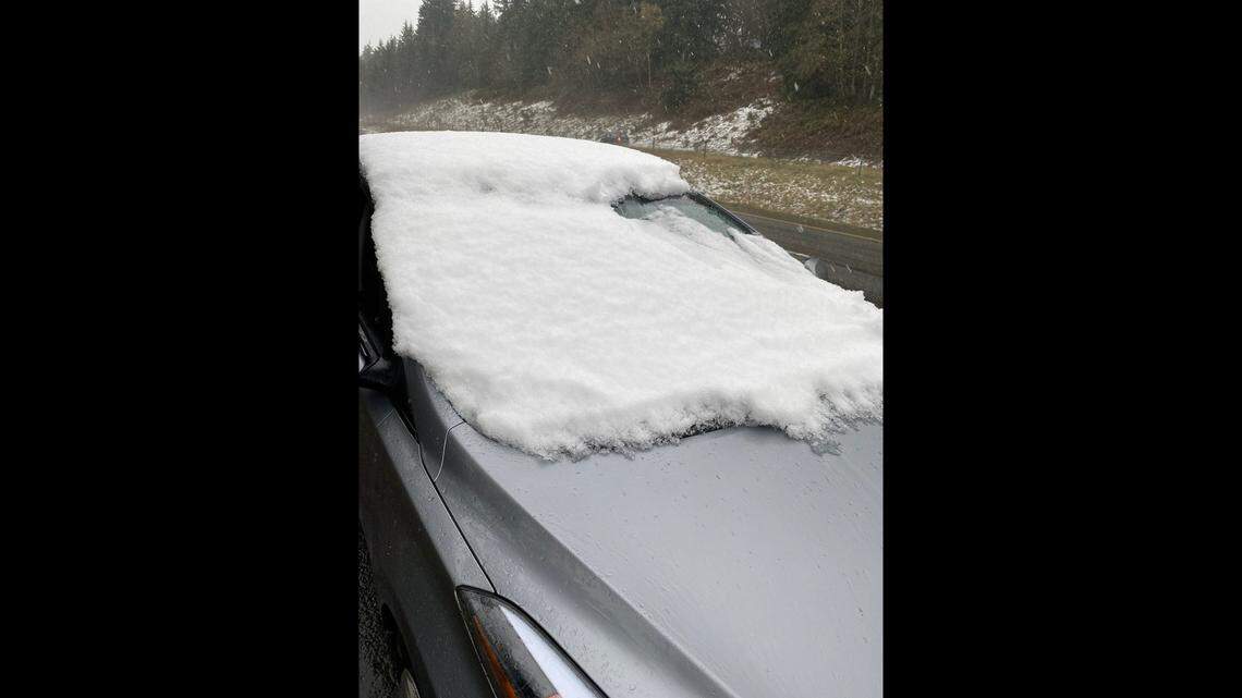 A driver was stopped by a trooper on State Route 16 with a pile of snow covering their windshield on Dec. 4, 2022, in Kitsap County, Washington officials said. The driver was fined.