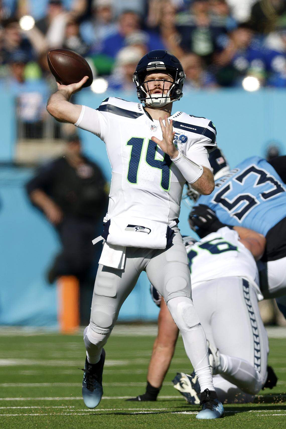 NASHVILLE, TENNESSEE - NOVEMBER 23: Sam Darnold #14 of the Seattle Seahawks makes a pass for a touchdown in the second quarter of the game against the Tennessee Titans at Nissan Stadium on November 23, 2025 in Nashville, Tennessee. (Photo by Wesley Hitt/Getty Images)