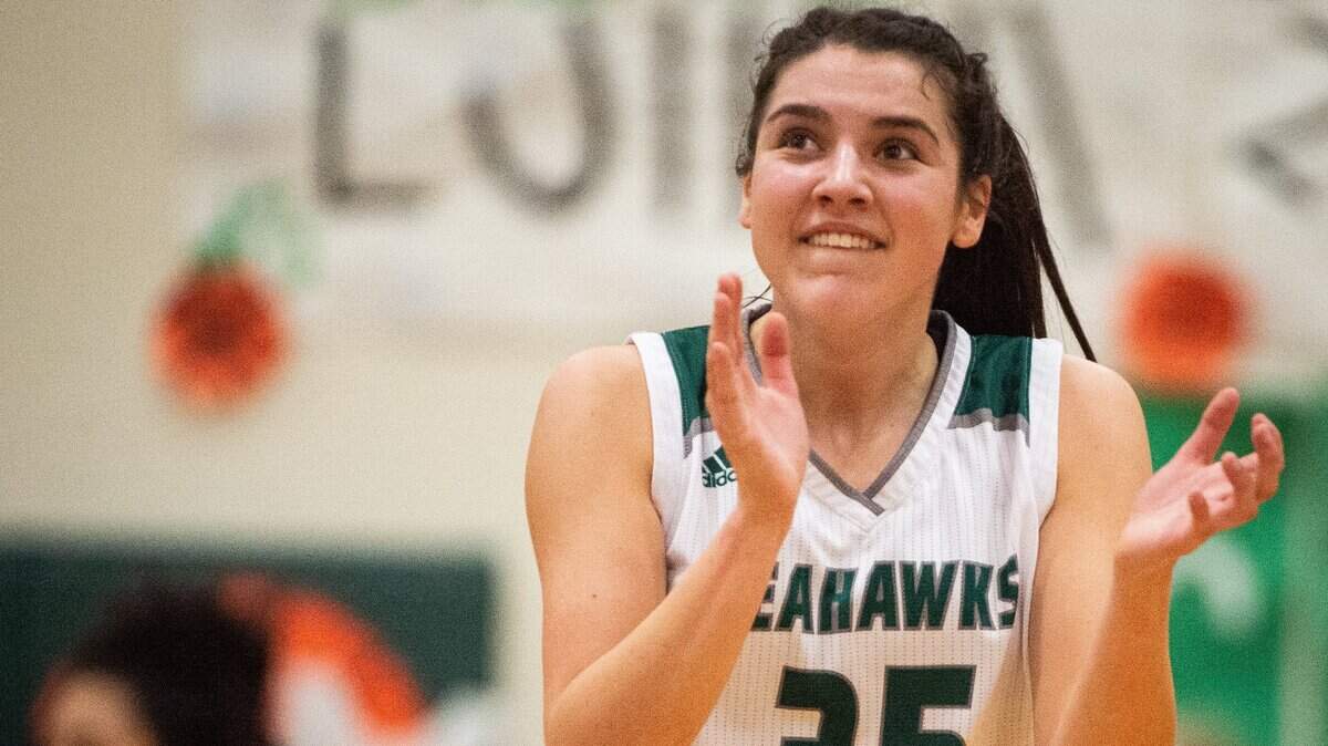 Peninsula’s Belle Frazier (35) reacts after a basket in the first quarter. Peninsula played Gig Harbor in a basketball game at Peninsula High School in Purdy, Wash., on Thursday, Jan. 31, 2019.