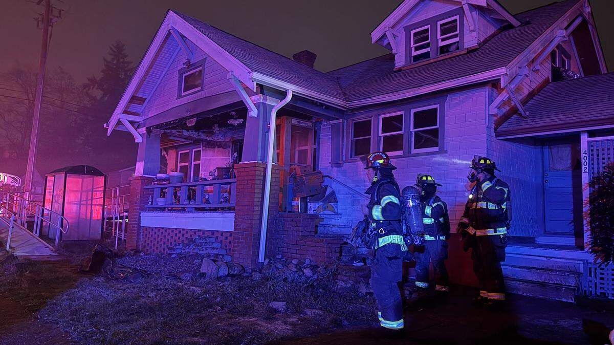 At least three people were taken to hospitals after a possible stabbing and house fire in Tacoma on Tuesday.