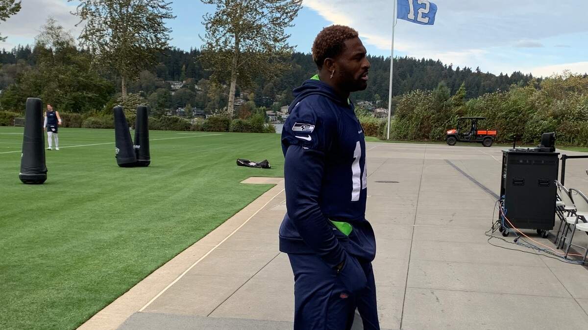 DK Metcalf walks off the field into the Seahawks’ training facility in Renton after not practicing again on Oct. 27, 2022. The wide receiver injured the patellar tendon in his left knee four days earlier in a game at the Los Angeles Chargers.