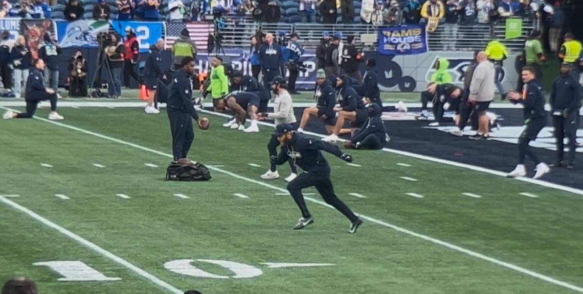 Cooper Kupp runs a pass route with veteran backup Drew Lock throwing to him during early warmups two hours before their Seahawks played the Los Angeles Rams in the NFC championship game Sunday, Jan. 25, 2026, at Lumen Field in Seattle.
