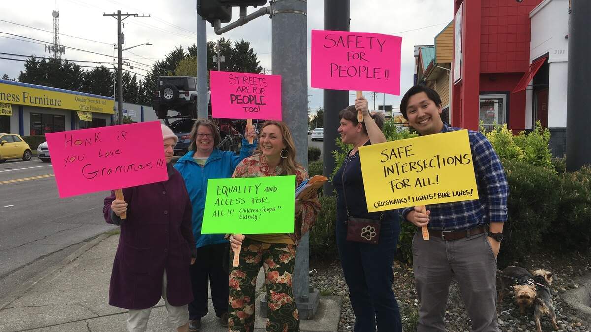 During the “Tacoma Mall Pedestrian Action Day” on Thursday April 25, residents gathered at the intersection of South 38th Street and South Cedar Street in Tacoma to raise awareness and concerns.