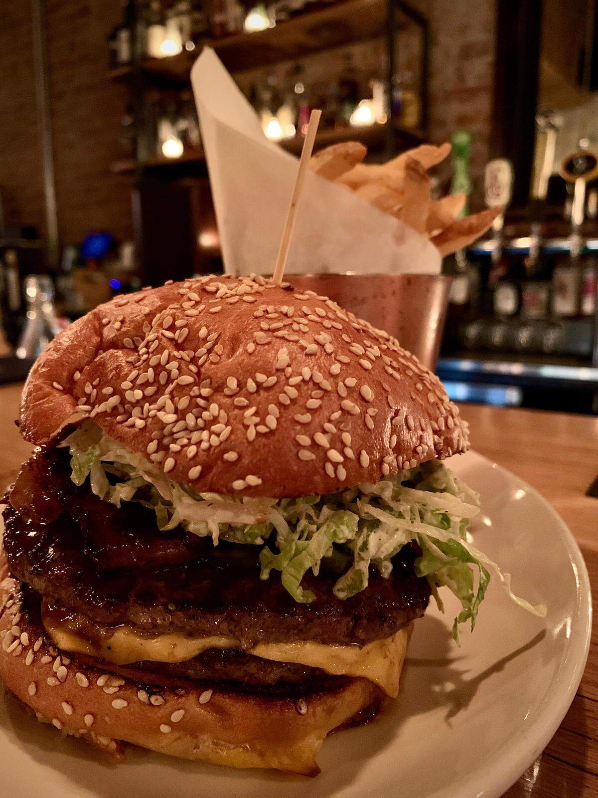 Wooden City in downtown Tacoma has a short but daily happy hour, which includes its double-patty burger for $12.