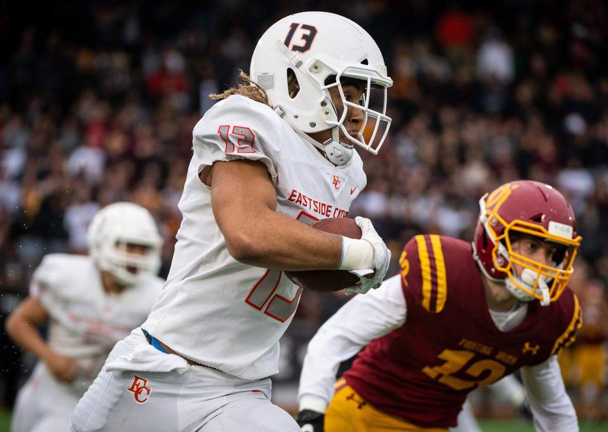 Eastside Catholic receiver Gee Scott Jr. breaks free from defenders. Eastside Catholic played O’Dea in the Class 3A state football championship game at Sparks Stadium in Puyallup, Wash., on Saturday, Dec. 7, 2019.