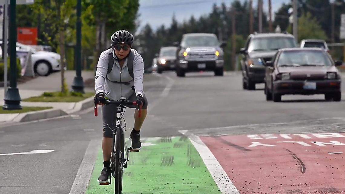 Washington state law says that bicyclists using the road have the same responsibilities as drivers.
