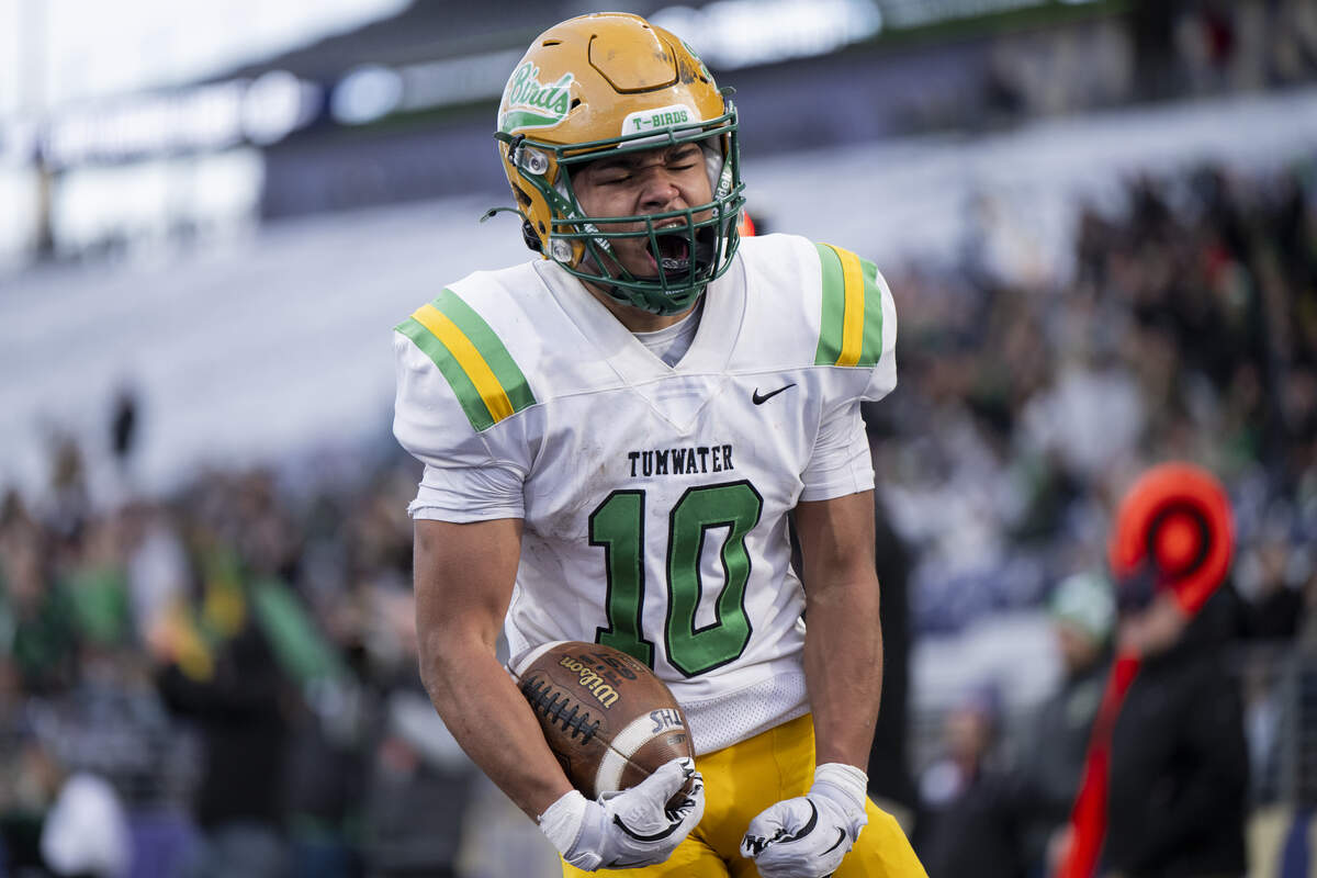 Tumwater running back Tyler Briscoe (10) reacts to a touchdown against Archbishop Murphy that will be called back on offensive holding during the second quarter of the 2A State Championship game at Husky Stadium, on Saturday, Dec. 6, 2025, in Seattle.