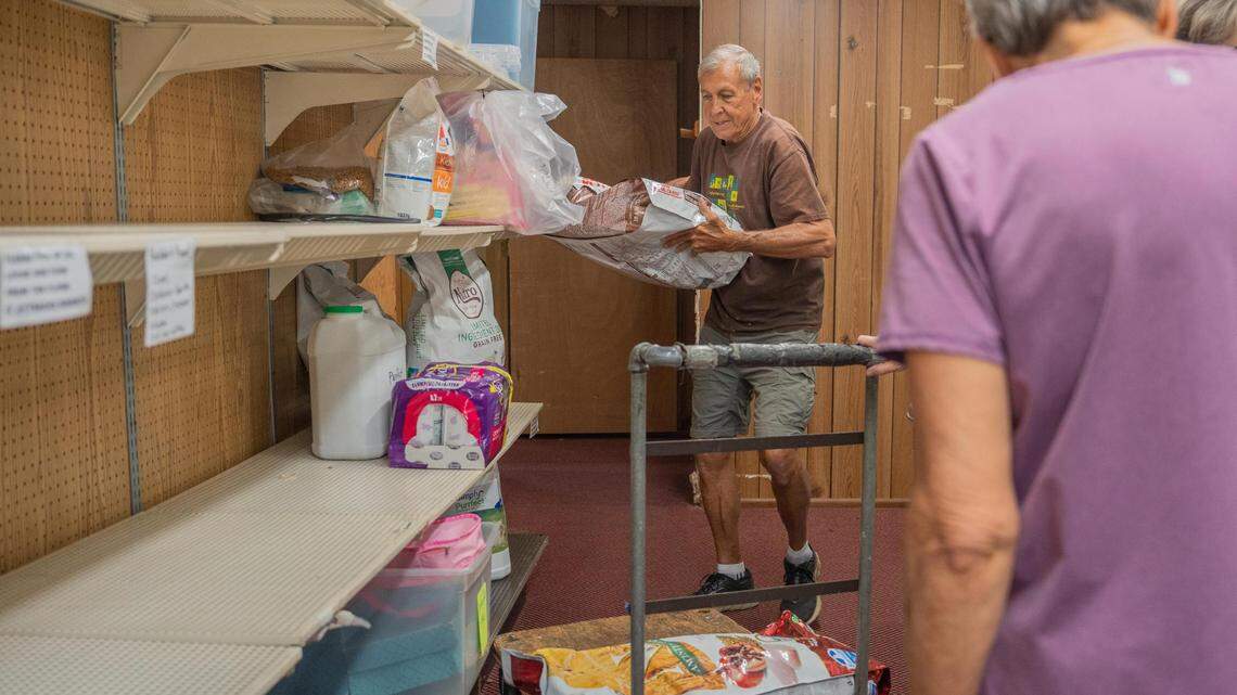 FISH Food Bank Volunteer Rich Peterson helps clear out the old building and move into their new facility on Friday July 8, 2022.