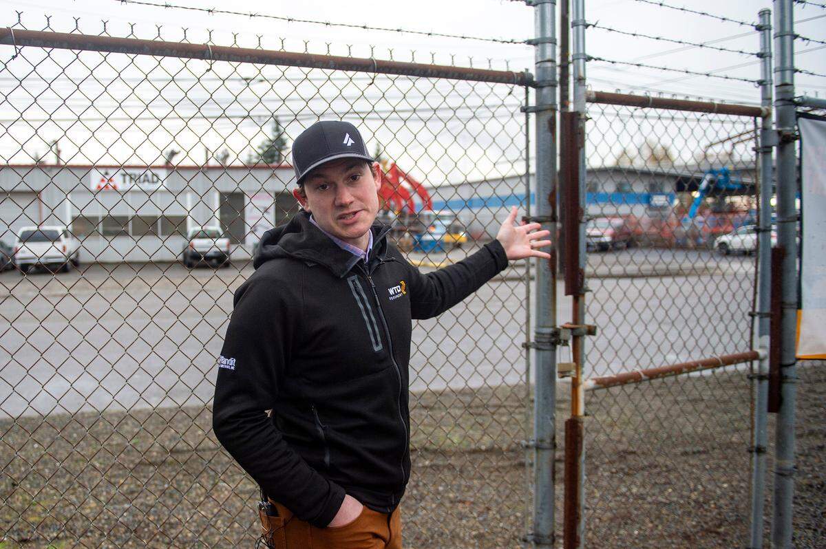 Ryan Makris, president and CEO of WTD Equipment, shows where some of the break-ins have occurred on his property off East Bay Street on Monday morning. Markis started the permitting for an electric fence a few months ago.