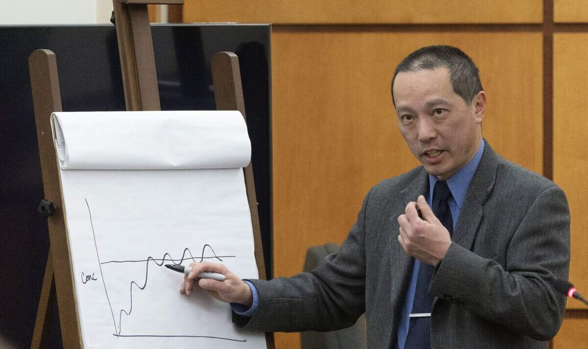 Asa Louis, a research scientist with the Washington State Patrol toxicology lab, explains how breaks in taking drugs affects the body to prosecuting attorney Kent Liu (not in photo) during the trial of three Tacoma Police officers regarding the killing of Manny Ellis at Pierce County Superior Court, Thursday Nov. 30, 2023, in Tacoma, Wash. Tacoma Police Officers Christopher Burbank, Matthew Collins and Timothy Rankine stand trial for charges related to the March 2020 killing of Manny Ellis. 225538