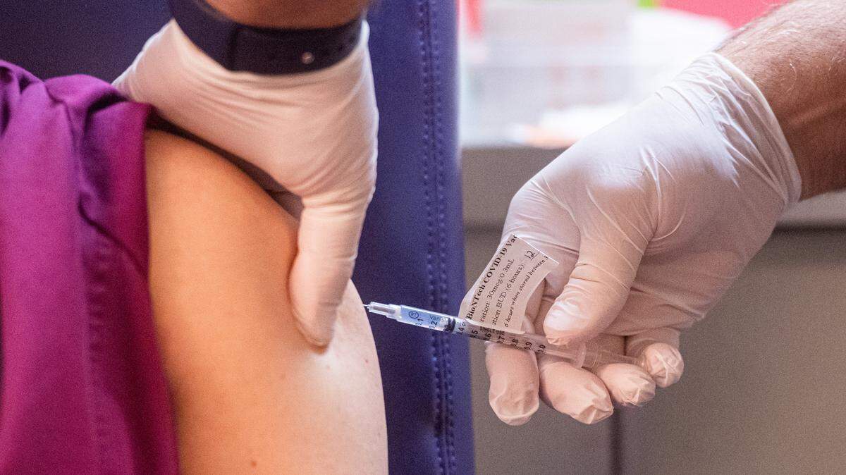 Medical staff and first responders received the first dose of the Pfizer COVID-19 vaccine at MultiCare Tacoma General Hospital in Tacoma, Wash., on Friday, Dec. 18, 2020.