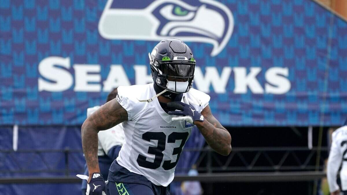 Seattle Seahawks safety Jamal Adams jogs on the field before NFL football practice Tuesday, Aug. 17, 2021, in Renton, Wash. The Seahawks signed Adams to a four-year contract extension Tuesday that is expected to make the former All-Pro the highest-paid safety in the NFL. (AP Photo/Ted S. Warren)