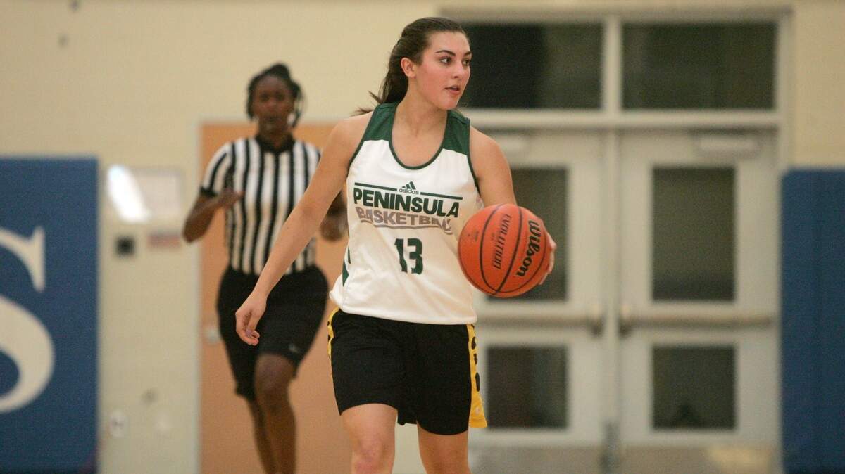 Peninsula's Esther Pappuleas in a summer league basketball game at Curtis High School.