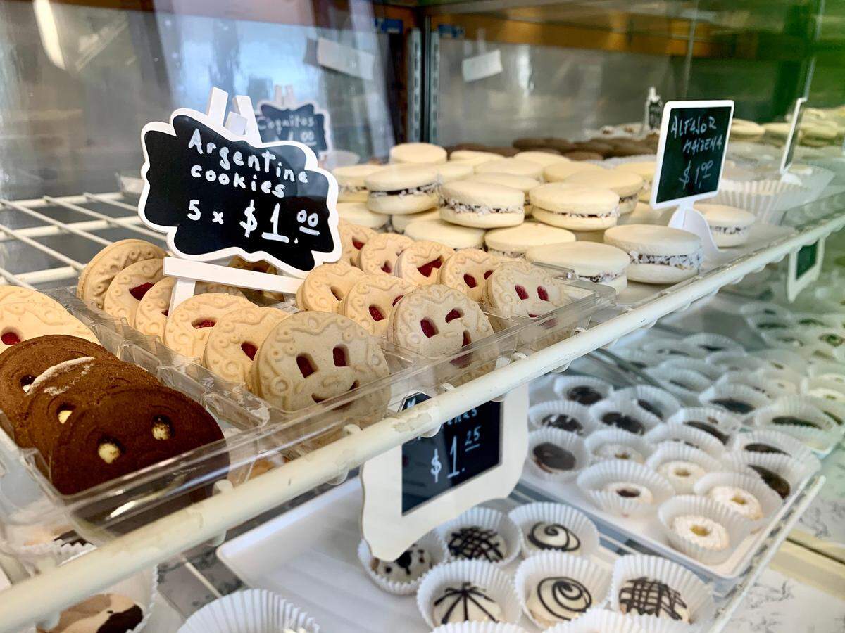 The jam-filled shortbreads and the alfajores (right) are two of Argentina’s iconic cookies, available at Sur Bakery in Lakewood.