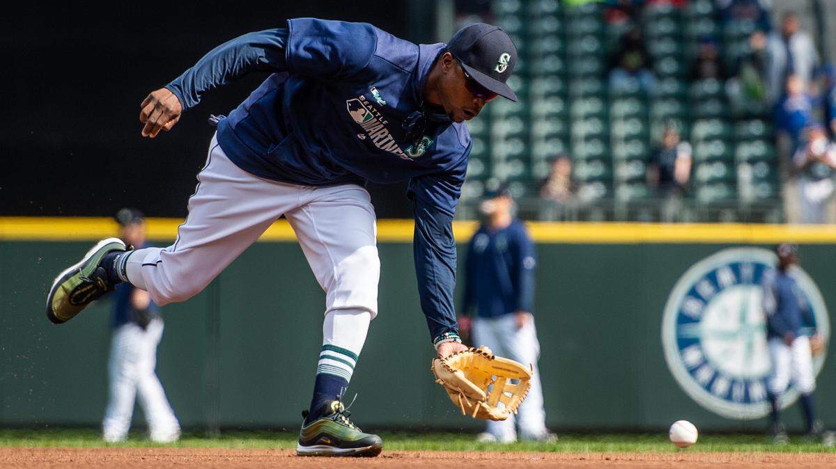 Tim Beckham fields ground balls during Mariners Fan Fest at T-Mobile Park in Seattle, Wash., on Saturday, March 23, 2019. 
