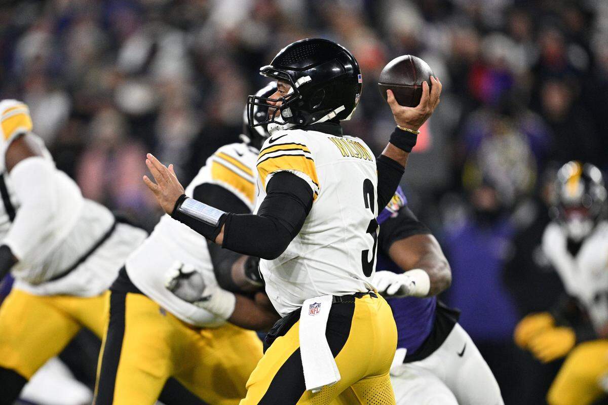 Jan 11, 2025; Baltimore, Maryland, USA; Pittsburgh Steelers quarterback Russell Wilson (3) passes in the first quarter against the Baltimore Ravens in an AFC wild card game at M&T Bank Stadium. Mandatory Credit: Tommy Gilligan-Imagn Images
