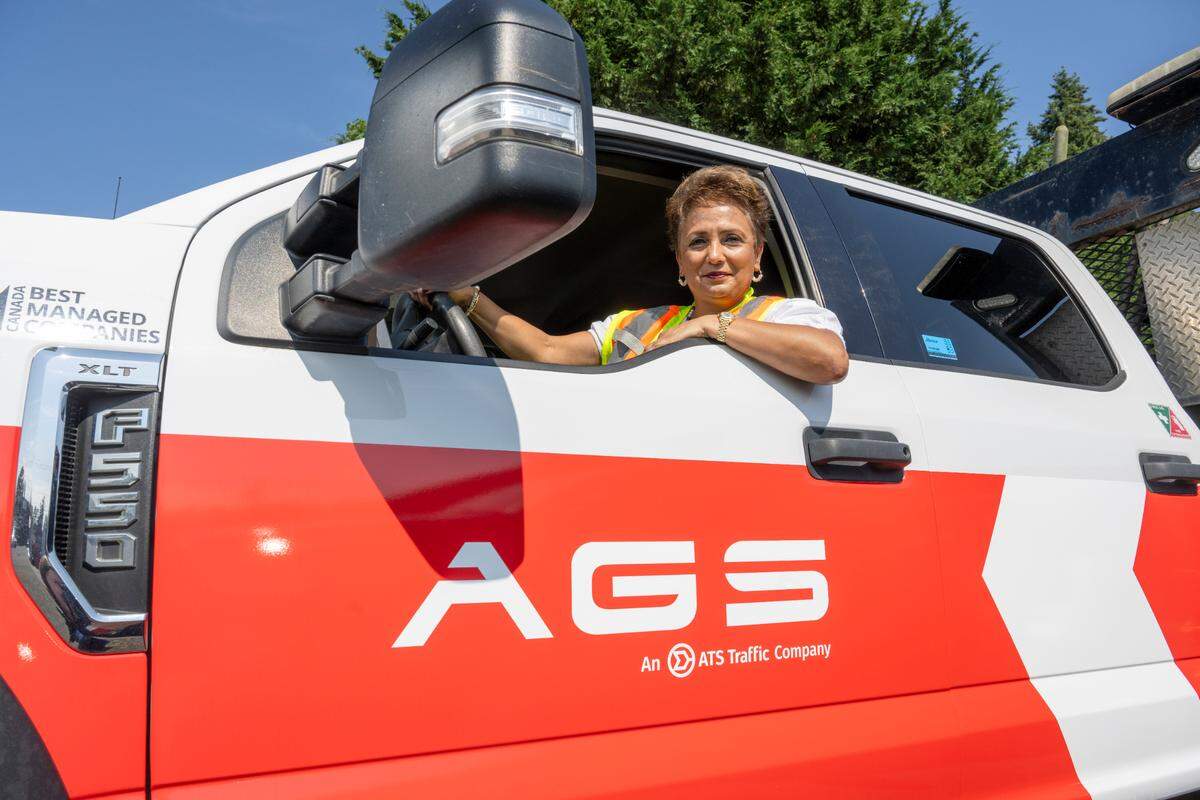 Arti O’Brien, the president of Advanced Government Services, sits in a company truck for a portrait on Tuesday, June 24, 2025, in Tacoma, Wash. O’Brien credits the safety equipment supplier business’s success to the support she received from the Minority Business Development Agency.