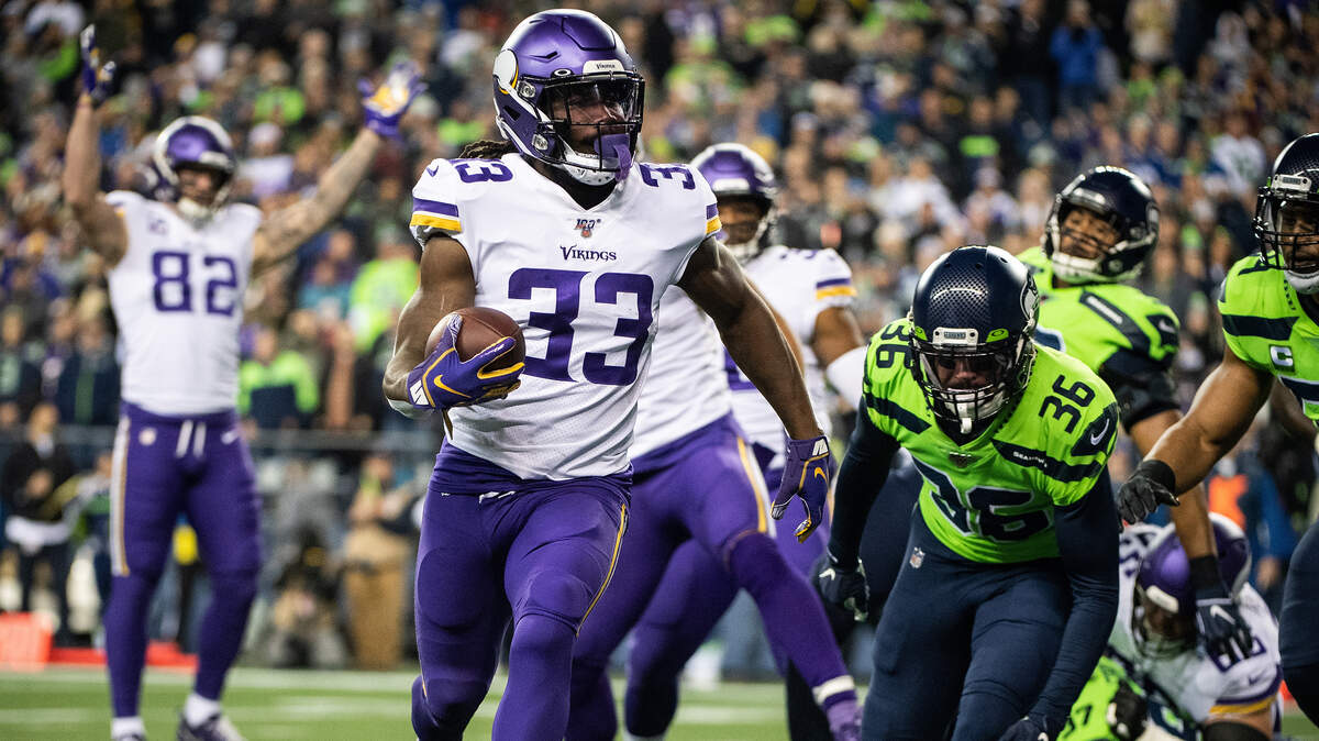 Minnesota Vikings running back Dalvin Cook (33) scores a touchdown during the first quarter. The Seattle Seahawks played the Minnesota Vikings in a NFL football game at CenturyLink Field in Seattle, Wash., on Monday, Dec. 2, 2019.
