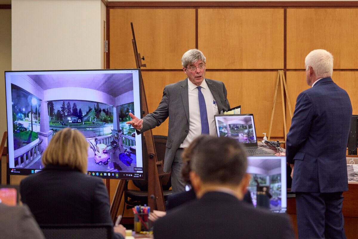 Defense Attorney Wayne Fricke, left, questions Grant Fredericks, a video forensic expert, right, during the trial of Tacoma Police Officers Christopher Burbank, Matthew Collins and Timothy Rankine in the killing of Manny Ellis at Pierce County Superior Court , Thursday, Oct. 5, 2023, in Tacoma, Wash. (John Froschauer/Pool Photo AP)