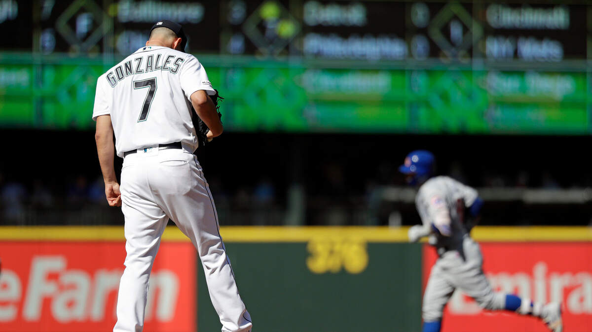 Seattle Mariners starting pitcher Marco Gonzales (7) waits for Chicago Cubs’ Javier Baez to round the bases behind on Baez’s solo home run in the second inning of a baseball game Wednesday, May 1, 2019, in Seattle. (AP Photo/Elaine Thompson)