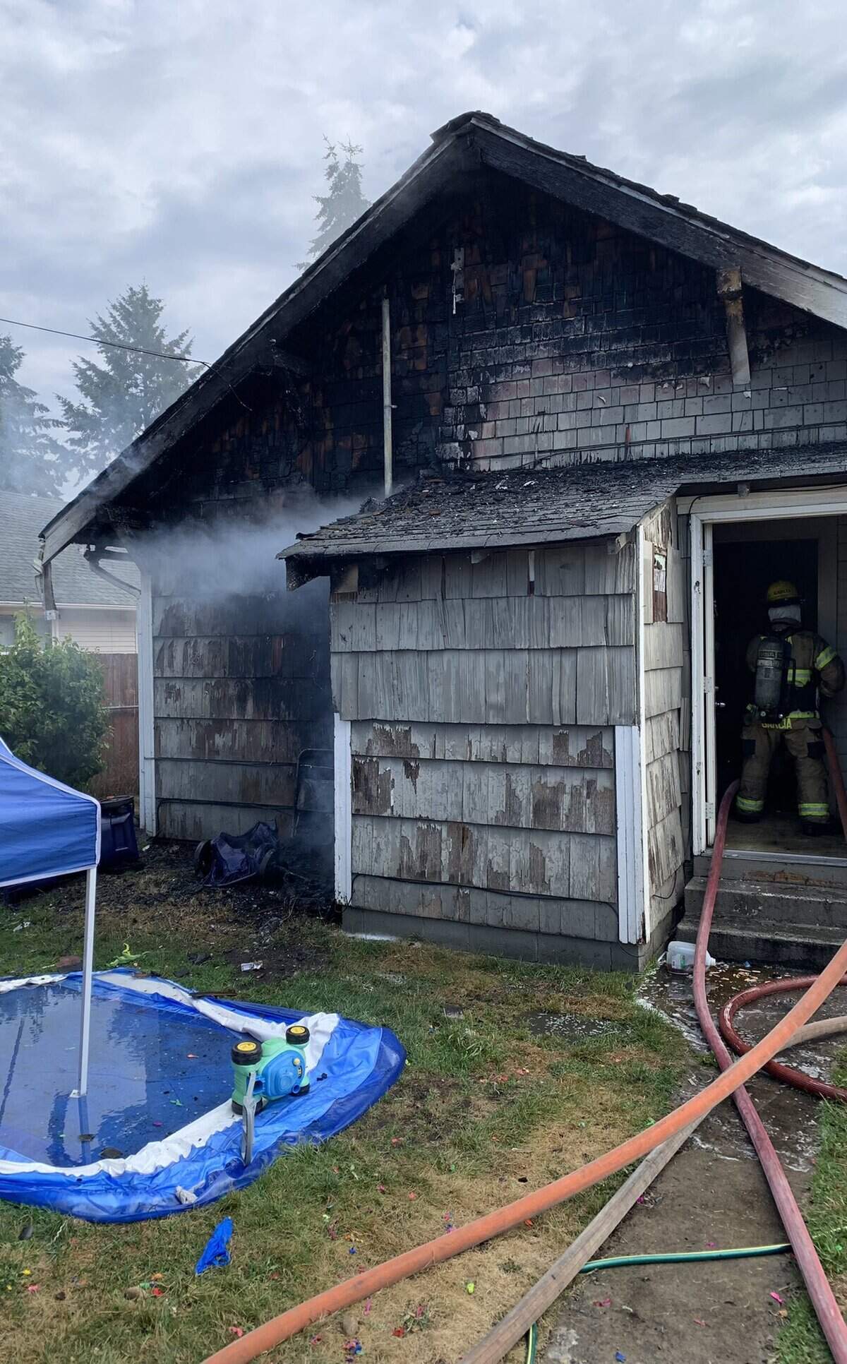 A fire that burned in a South Tacoma house on Friday caused “heavy damage” to the home’s interior and exterior, according to Tacoma Fire Department.