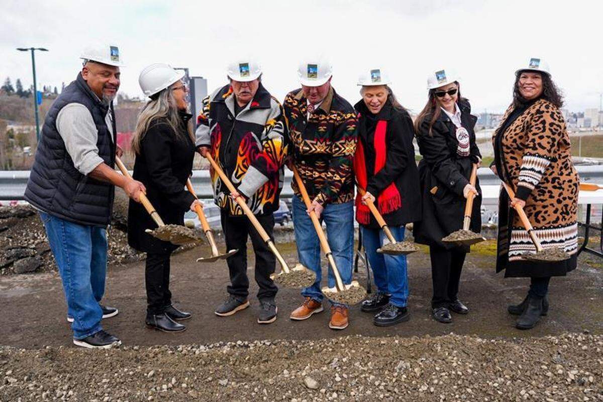 Members of the Puyallup Tribal Council hold shovels at the new Tribal Administration building groundbreaking in Tacoma on March 24. Councilmembers (left to right) are Fred Dillon, Monica Miller, Chairman Bill Sterud, James Rideout, Vice Chairwoman Sylvia Miller, Annette Bryan, and Anna Bean.