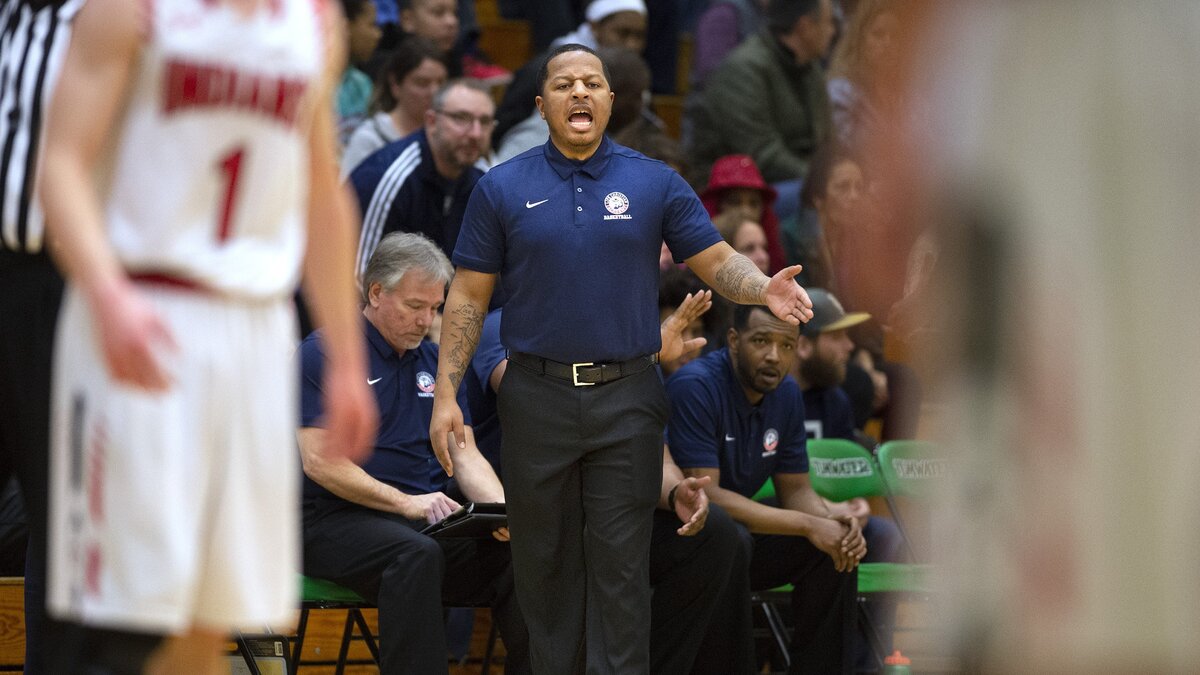 Life Christian Academy head coach Charles Simmons directs the Eagles during their 2B state regional boys basketball game against the Toledo Indians at Tumwater High School on Saturday, Feb. 23, 2019.