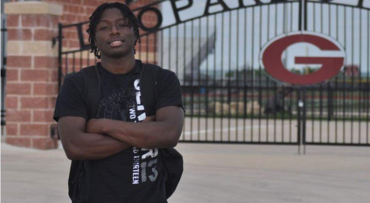 David Moore in 2013 outside his high school stadium in Gainesville, Texas, before he played Division-II college football at East Central University in Ada, Oklahoma (enrollment 4,500).
