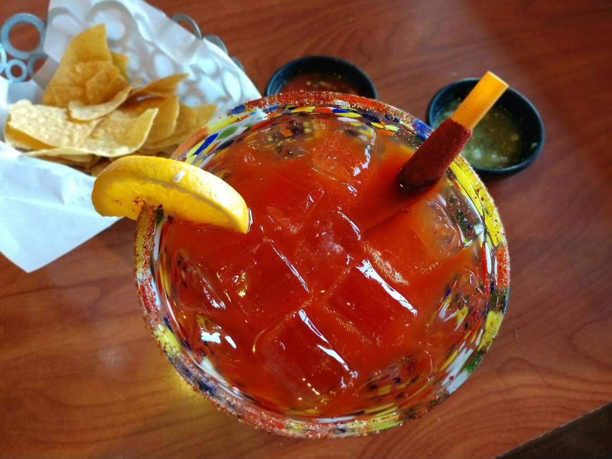 The Mango Chamoy Margarita from El Toro is made with tequila, mango puree, citrus and tequila. It’s served with a rim dusted with chile-lime salt and served with a plastic straw wrapped in tamarind candy.