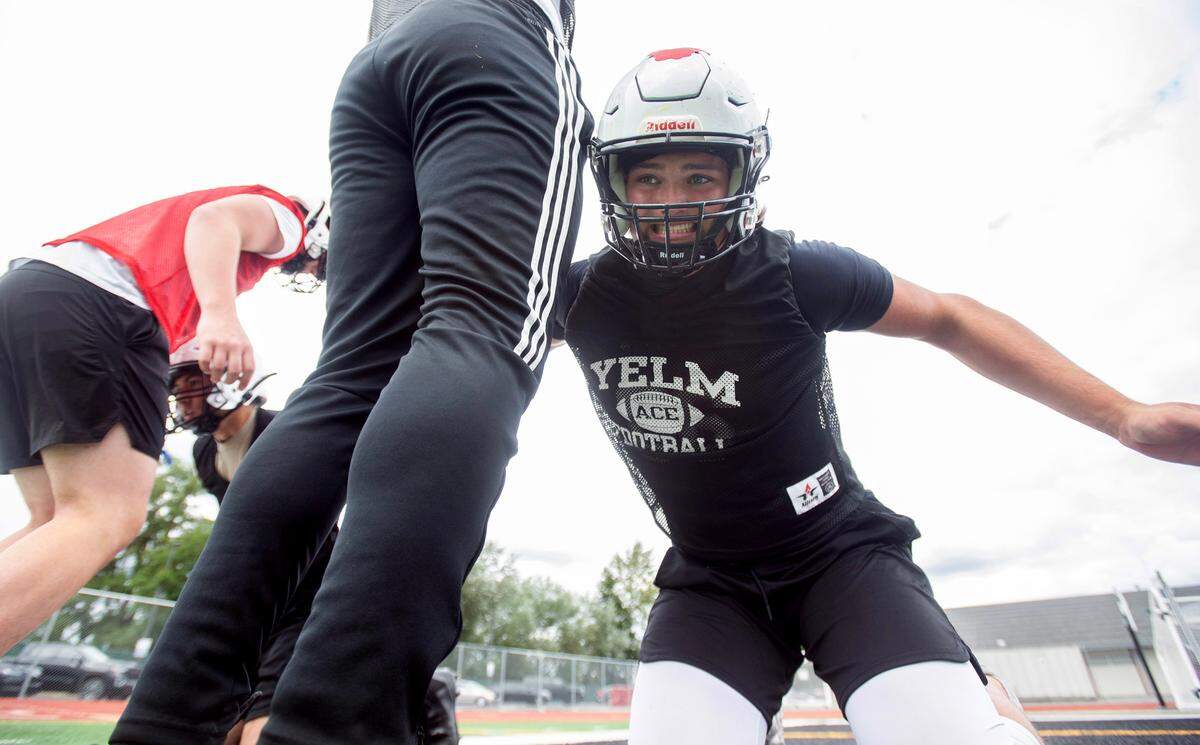 Yelm defensive lineman Chris Hauss runs through drills during the opening day of football practice at Yelm High School in Yelm, Washington, on Wednesday, Aug. 21, 2024.