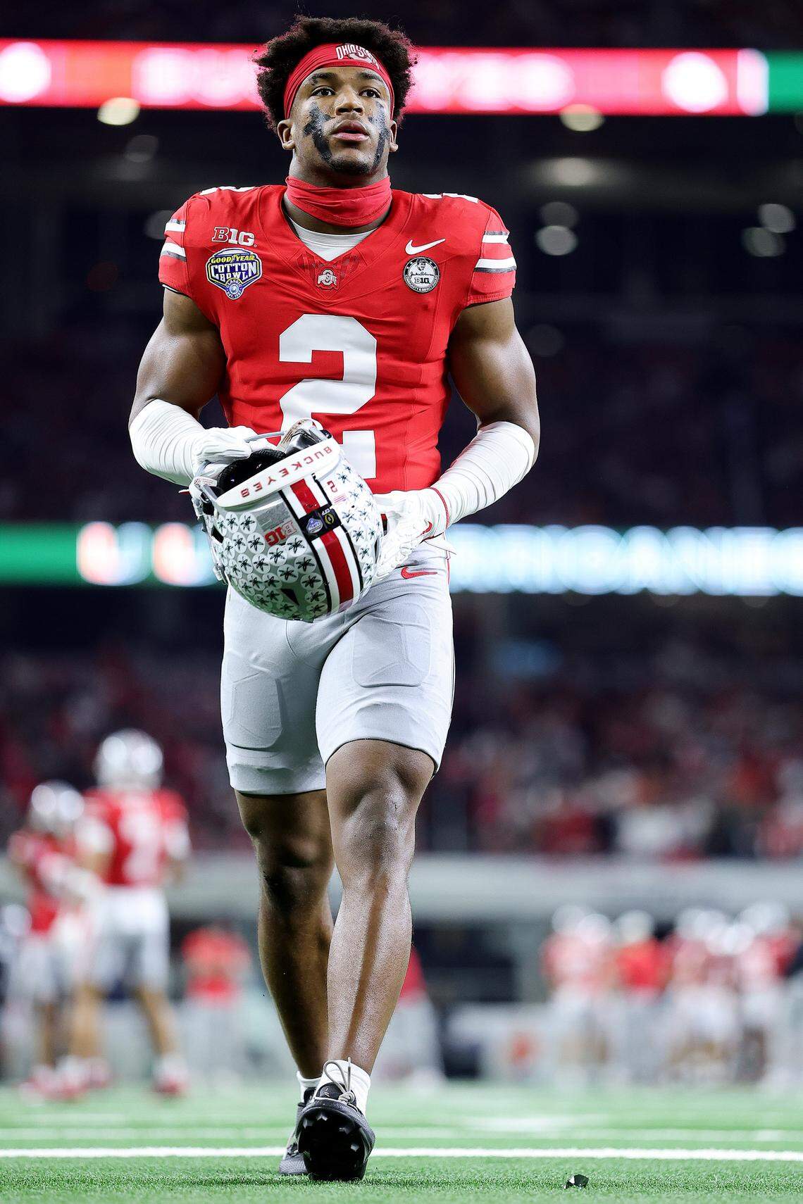 ARLINGTON, TEXAS - DECEMBER 31: Caleb Downs #2 of the Ohio State Buckeyes takes the field prior to a game against the Miami Hurricanes during the 2025 College Football Playoff Quarterfinal at the 90th Goodyear Cotton Bowl Classic at AT&T Stadium on December 31, 2025 in Arlington, Texas. (Photo by Alex Slitz/Getty Images)