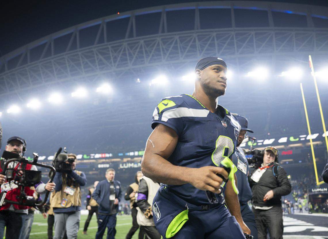 Seattle Seahawks running back Kenneth Walker III (9) runs off the field after his three touchdown performance against the San Francisco 49ers the NFC Divisional Round game at Lumen Field, on Saturday, Jan. 17, 2026, in Seattle.