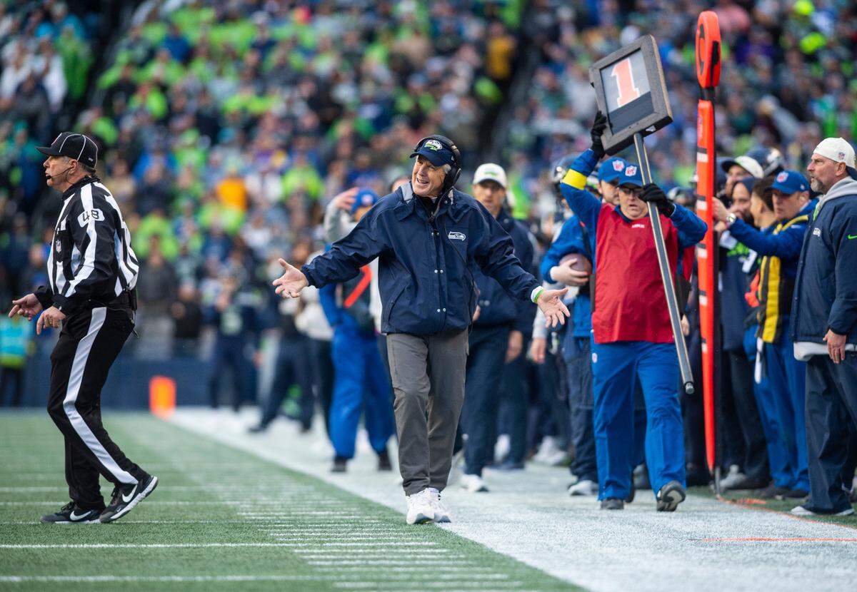 Seattle Seahawks head coach Pete Carroll argues with referees about a call that was made in the fourth quarter of an NFL game against the Los Angeles Rams at Lumen Field in Seattle, Wash. on Jan. 8, 2023. The Seahawks defeated the Rams in overtime 19-16.