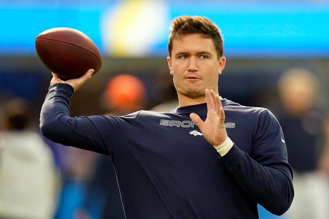 Denver Broncos quarterback Drew Lock warms up before an NFL football game against the Los Angeles Chargers Sunday, Jan. 2, 2022, in Inglewood, Calif. (AP Photo/Jae C. Hong)