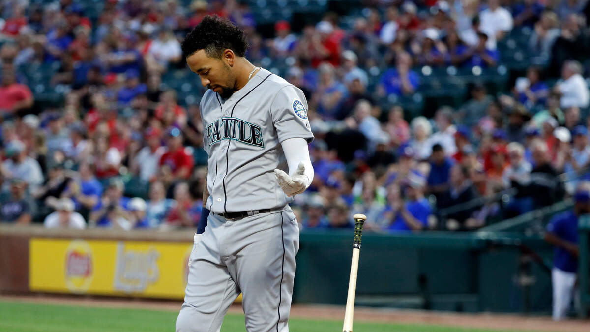 Seattle Mariners’ J.P. Crawford tosses his bat after striking out against Texas Rangers picher Mike Minor in the fourth inning of a baseball game in Arlington, Texas, Monday, May 20, 2019.