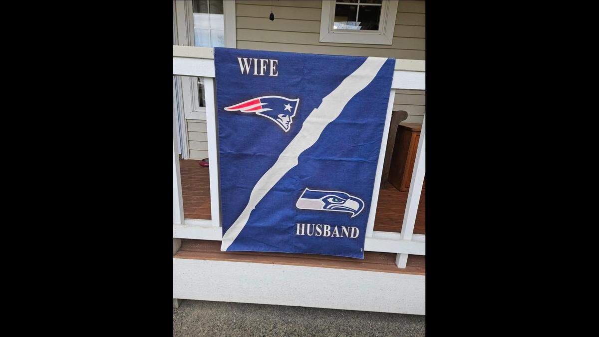 Hansen hangs a flag outside her home making her and her husband’s allegiances clear.