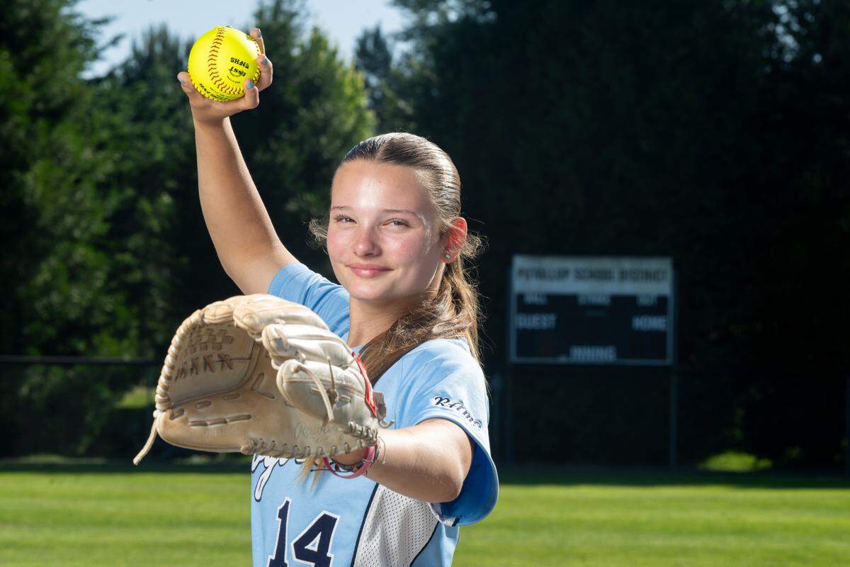 The News Tribune’s 2025 All-Area softball player of the year, Rogers High School freshman pitcher Sierra Murray stands for a portrait on Tuesday, June 10, 2025, at the team’s home field in Puyallup, Wash.