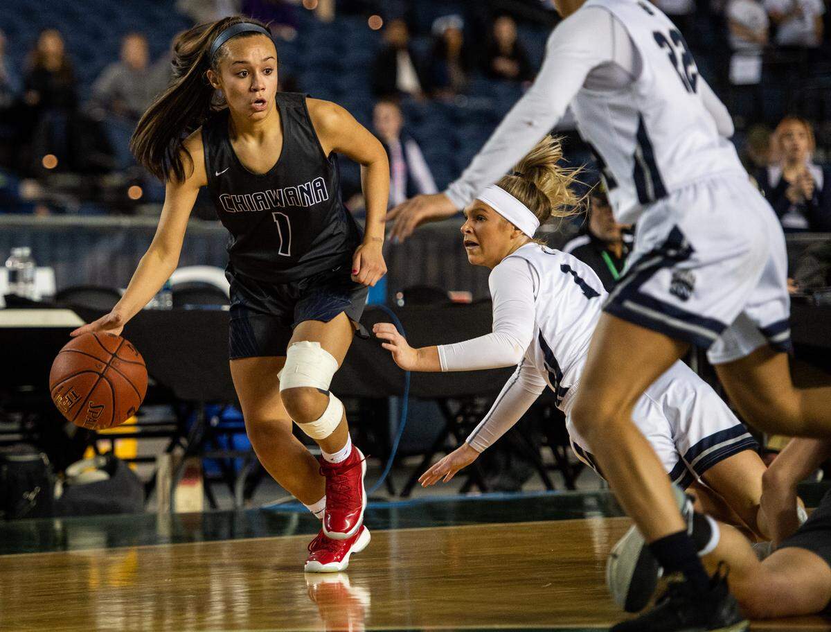 Chiawana’s Macey Morales (1) drives to the basket in February 2019.