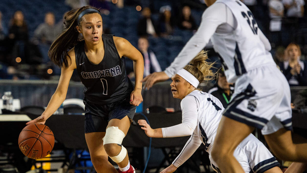 Chiawana’s Macey Morales (1) drives to the basket during overtime. Glacier Peak played Chiawana in a basketball game during the Hardwood Classic basketball tournament at the Tacoma Dome in Tacoma, Wash., on Wednesday, Feb. 27, 2019.
