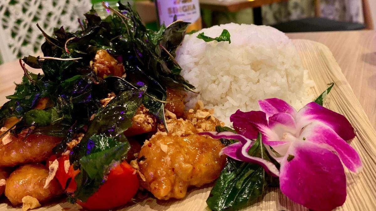 Bloom Thai brings a modern menu of Thai dishes to a cute space in Lakewood. Dishes like the crispy Bangkok garlic chicken with rice and crispy basil are served in generous portions on bamboo plates.