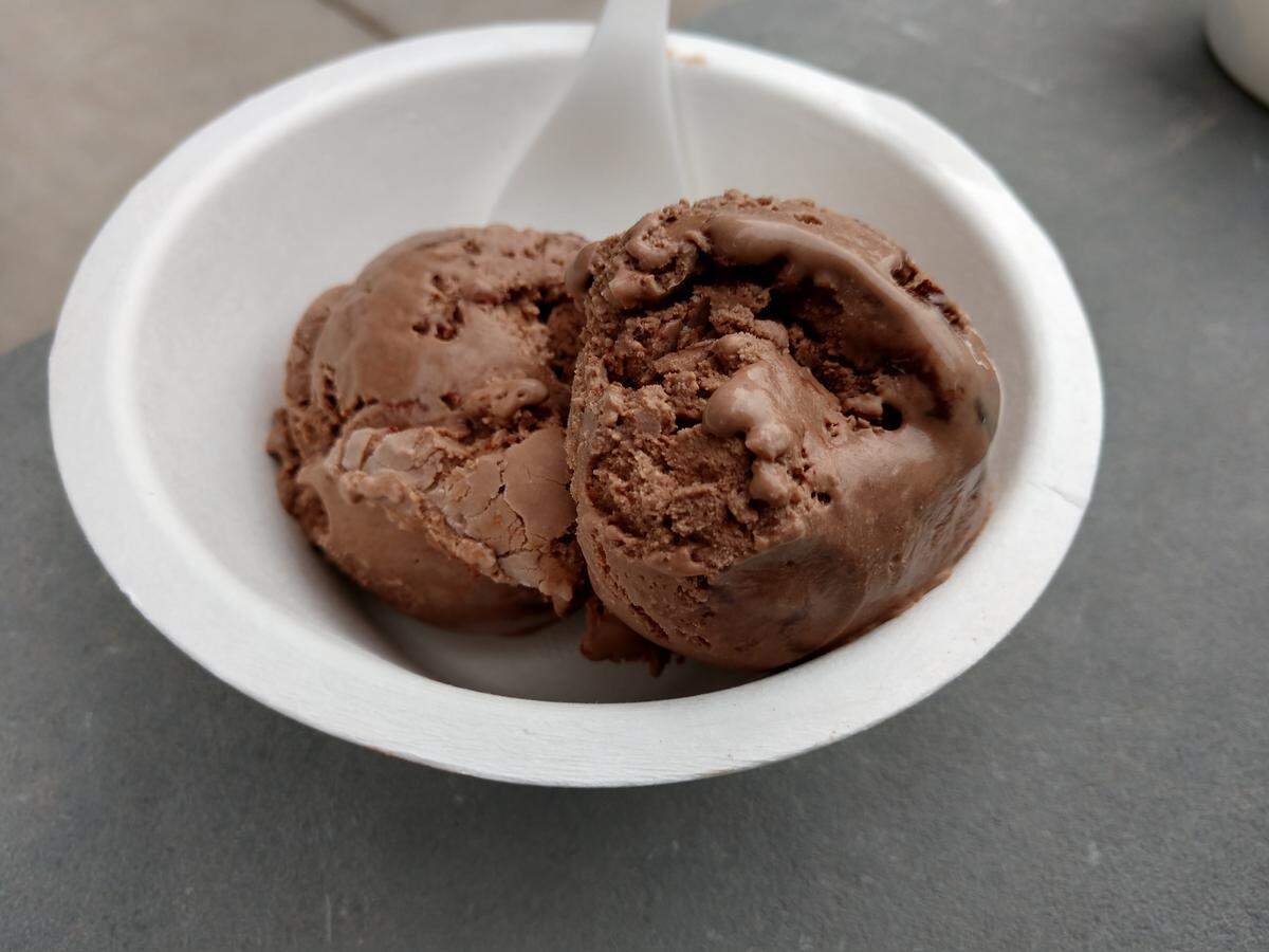 Fudgy brownie is chocolate ice cream studded with chunks of brownies. The ice cream is one flavor of many from Bliss Small Batch Creamery.