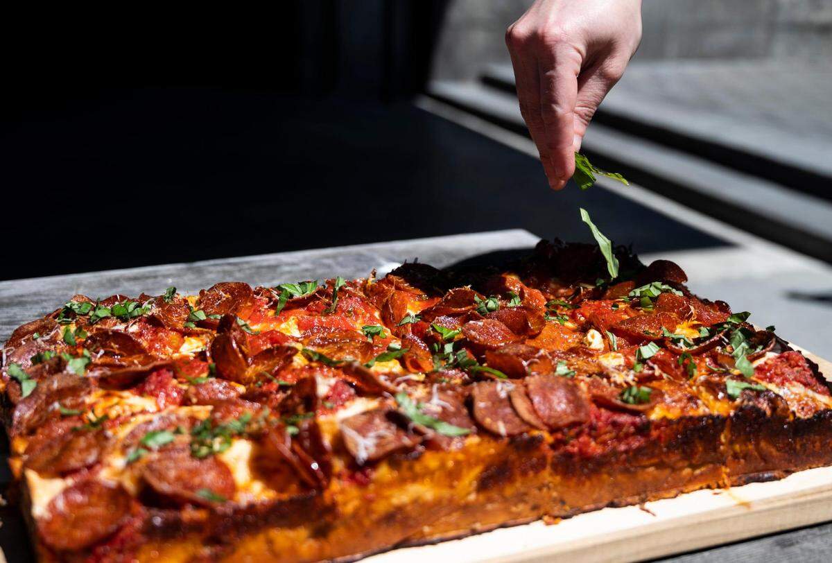 Outpost perfected a recipe for Grandma-style pizza in recent yeras, selling it only by the slice an only on Fridays (shown here in June 2022).