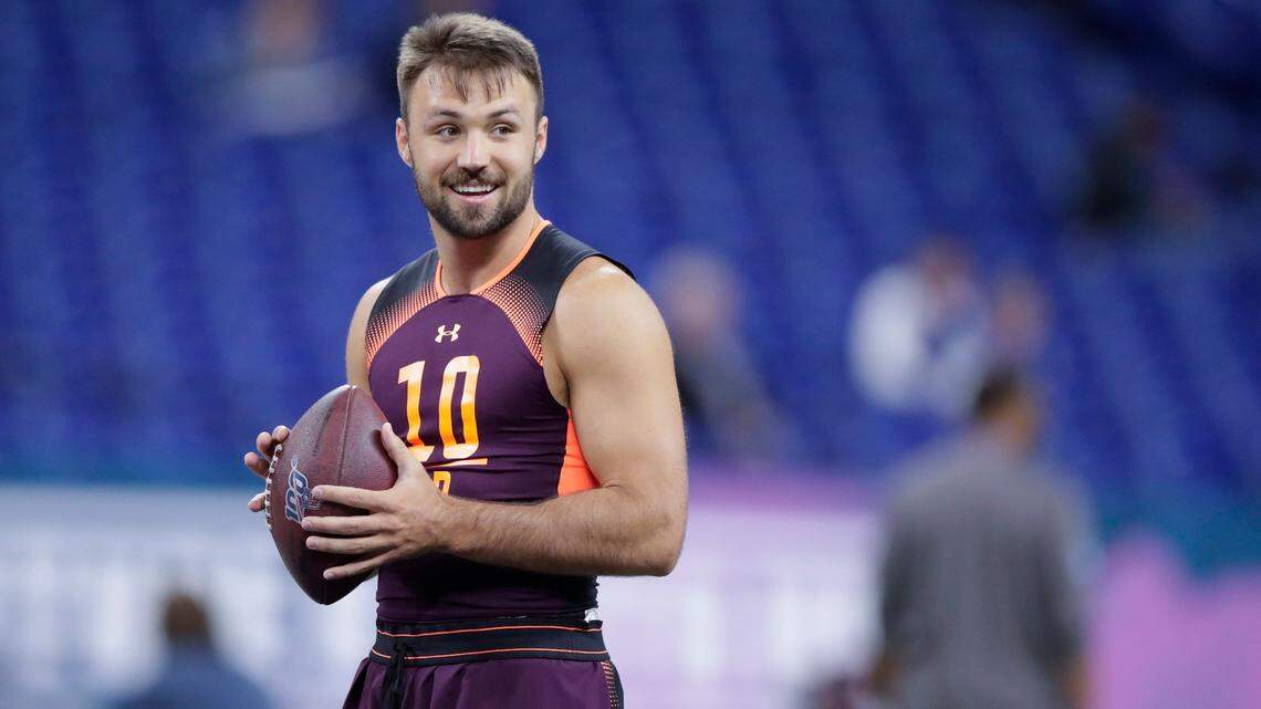 Washington State quarterback Gardner Minshew II runs a drill at the NFL football scouting combine in Indianapolis, Saturday, March 2, 2019. (AP Photo/Michael Conroy)