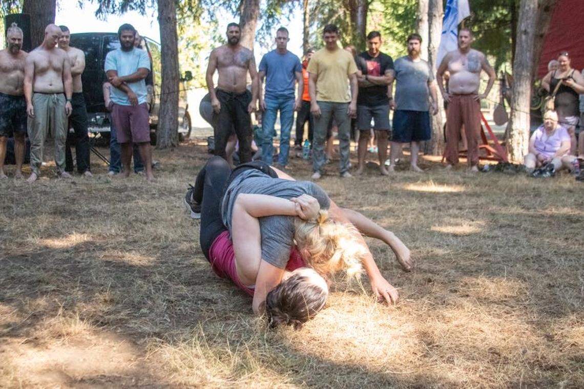 Warrior Life Martial Arts students do glima at a Viking festival in August 2023.