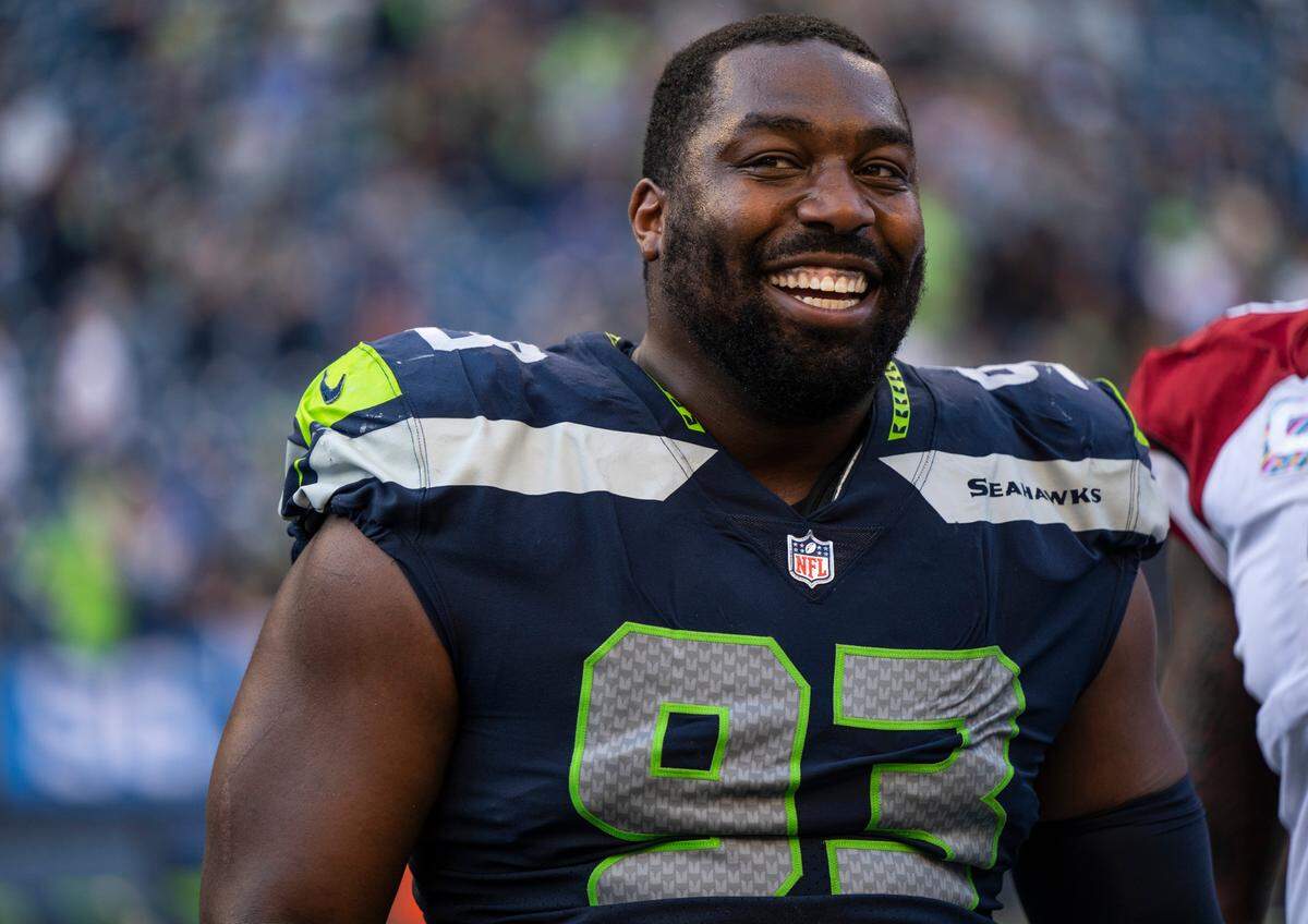 Seattle Seahawks defensive end Shelby Harris (93) smiles after winning 19-9 against the Arizona Cardinals at an NFL game on Sunday, Oct. 16, 2022, at Lumen Field in Seattle.