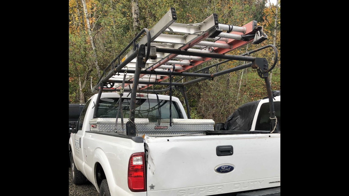 A 36-year-old man is accused of stealing a truck and driving off while the owner clung to the ladders on the roof rack in Portland on Nov. 3, police said.