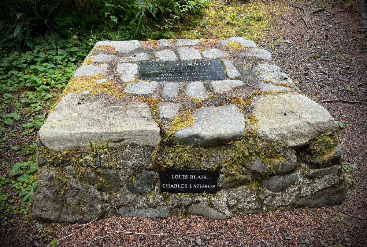 A stone monument remembers the Wild Man of the Wynoochee, John Tornow, as well as two of the men he killed, trapper Louis Blair and Charles Lathrop, a childhood friend of Tornow’s. All three men died at this site in 1913, deep in the Wynoochee River valley.