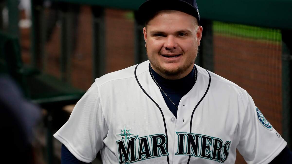 Seattle Mariners’ Daniel Vogelbach stands in the dugout before a baseball game against the Houston Astros, Monday, April 16, 2018, in Seattle. (AP Photo/Ted S. Warren)