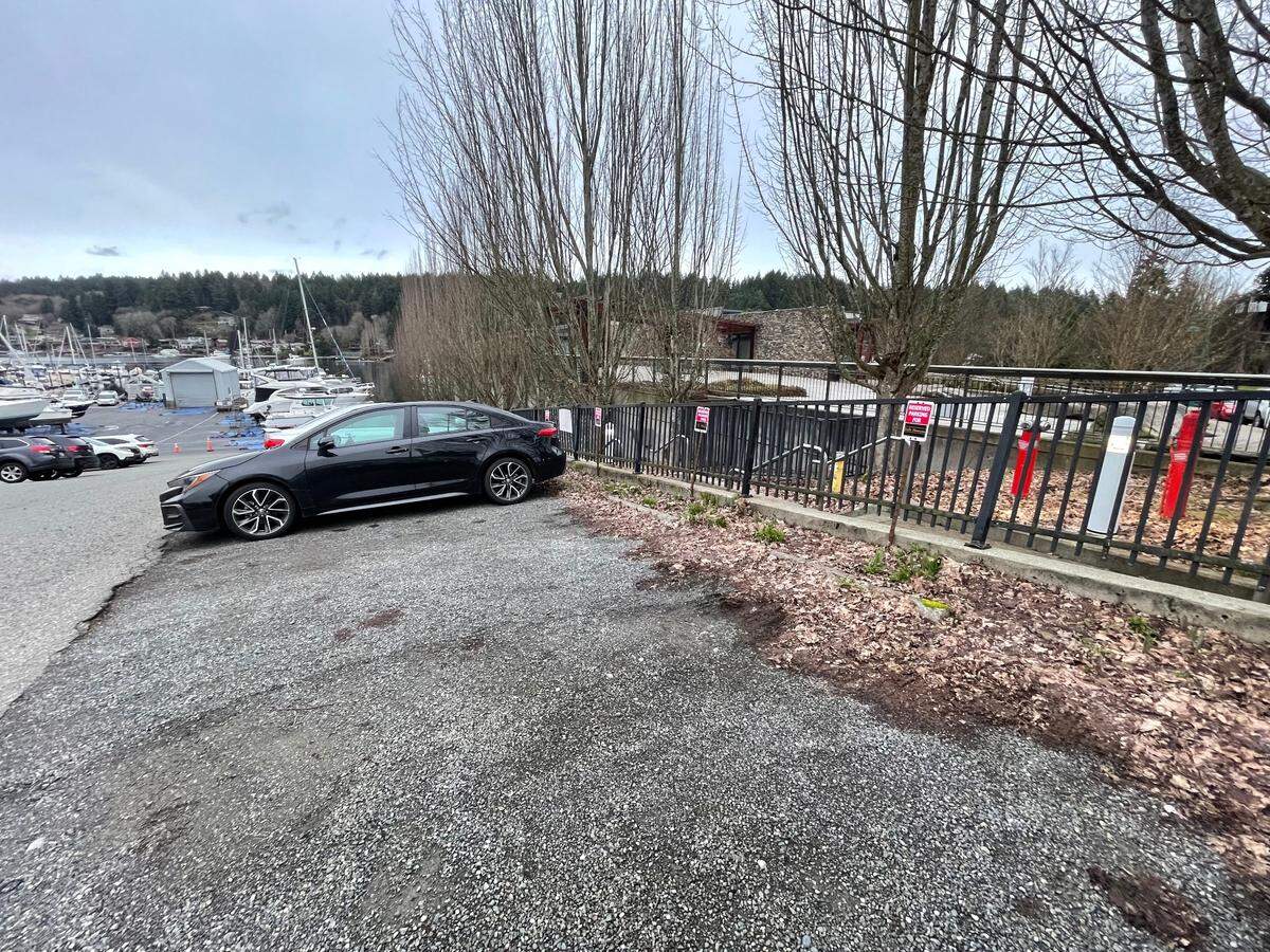 The old Bella Femmina building at 3108 Harborview Dr. in downtown Gig Harbor has about 10 designated parking stalls for customers in a gravel lot across the street from the building.